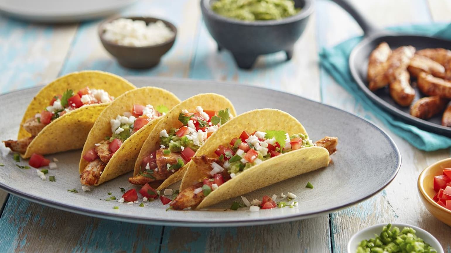 Chicken and Layered Guacamole Tacos - Mexican Recipes - Old El Paso