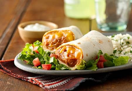 Bean Cheese Burritos Mexican Recipes Old El Paso Next, add a ¼ cup of the strained and washed black beans on each shell on top fo the cheese. classic bean and cheese burritos