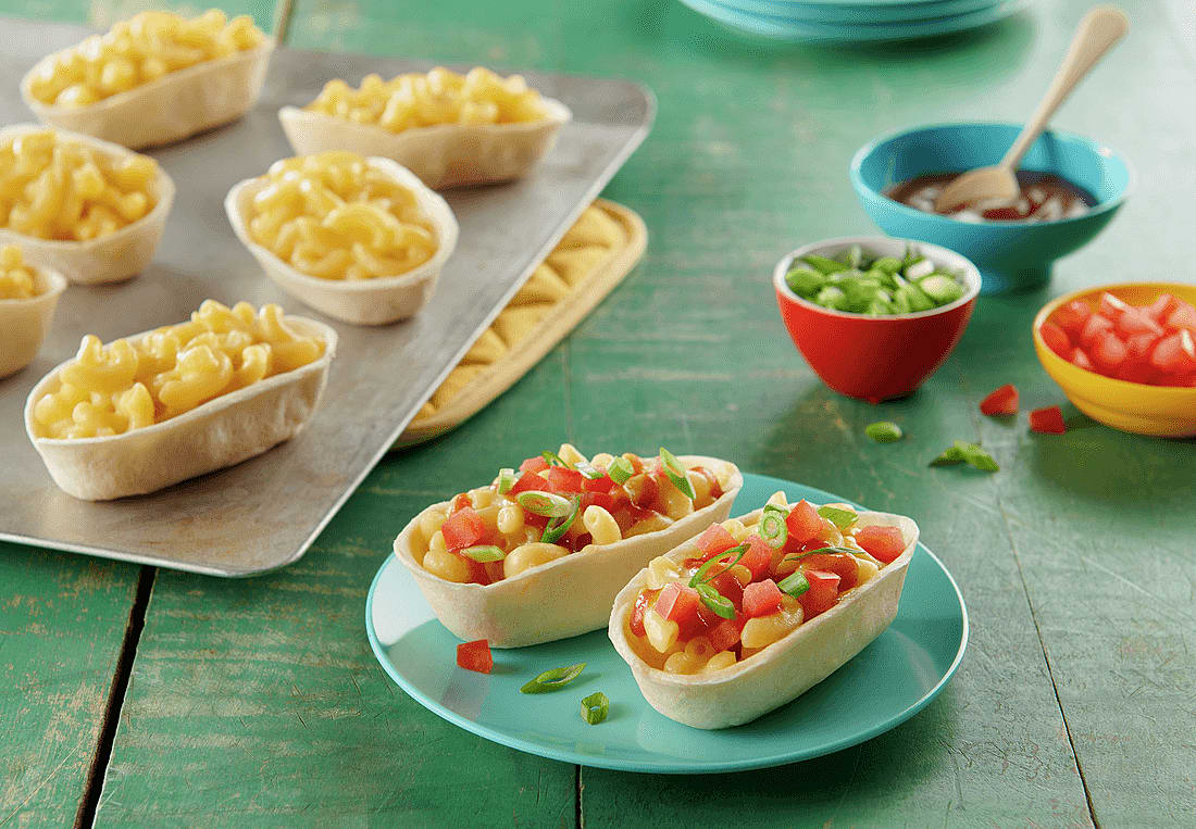 Mini Mac And Cheese Taco Bowls Mexican Recipes Old El Paso Top each with a scoop of black beans, corn, salsa, cheddar cheese, cooked peppers and onions, and taco meat. mini mac and cheese taco bowls