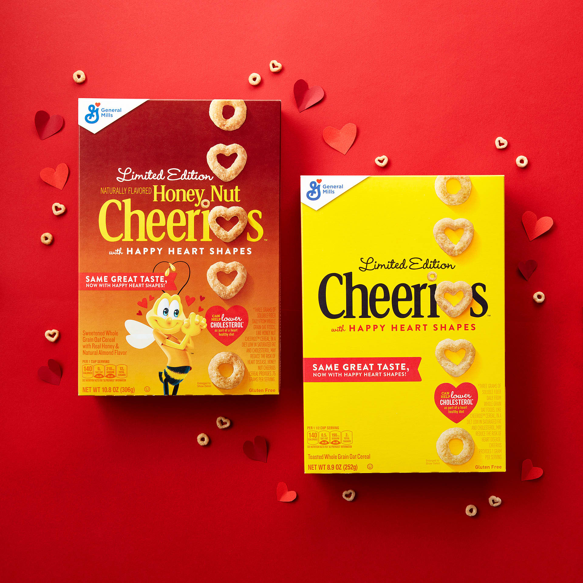 Cheerios heart shapes cereal boxes with red background