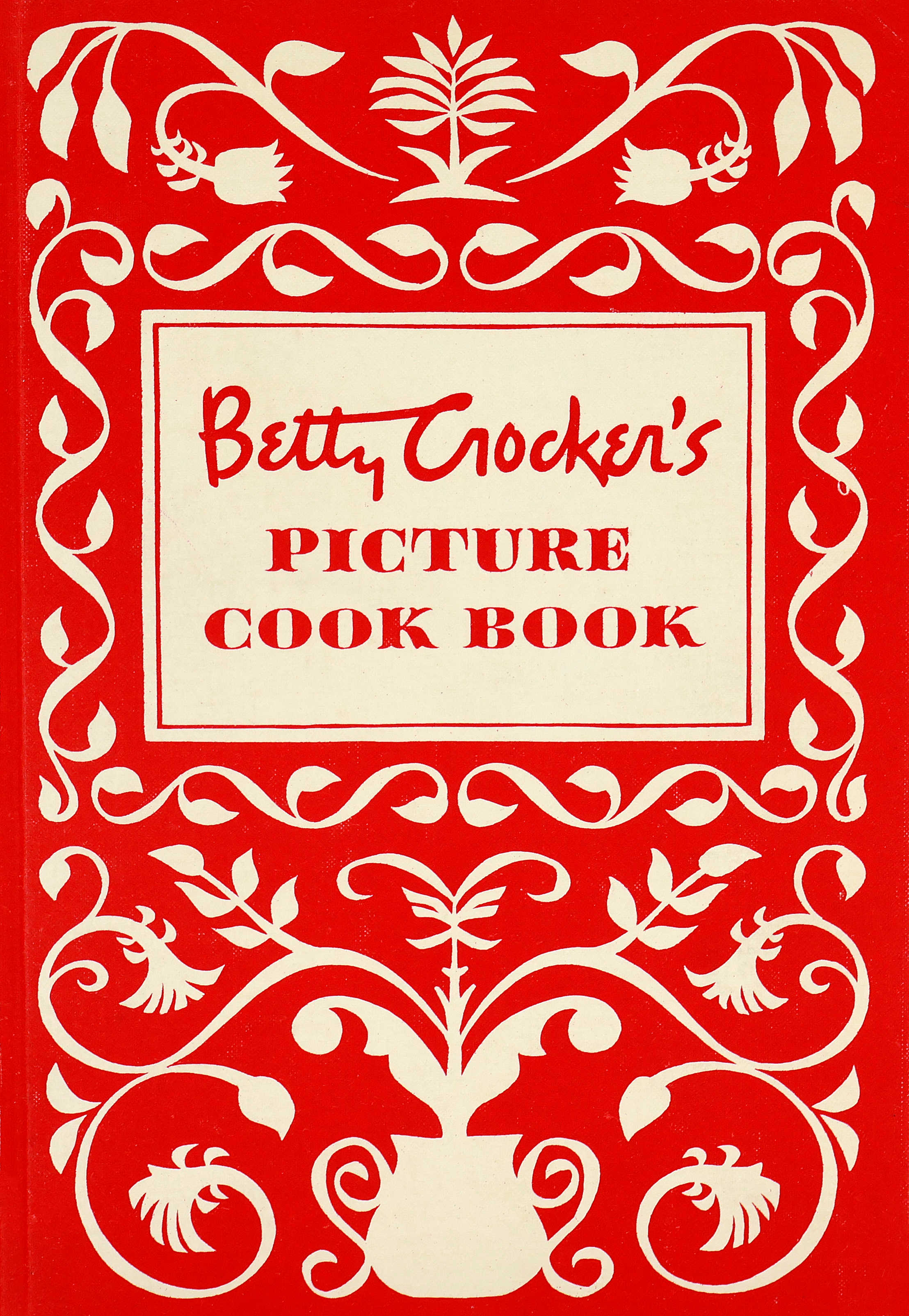 o	Cover of the 1950 Betty Crocker Cookbook that is red and white with Pennsylvania Dutch-looking scrolling artwork resembling a pot with vines and flowers growing out of it.