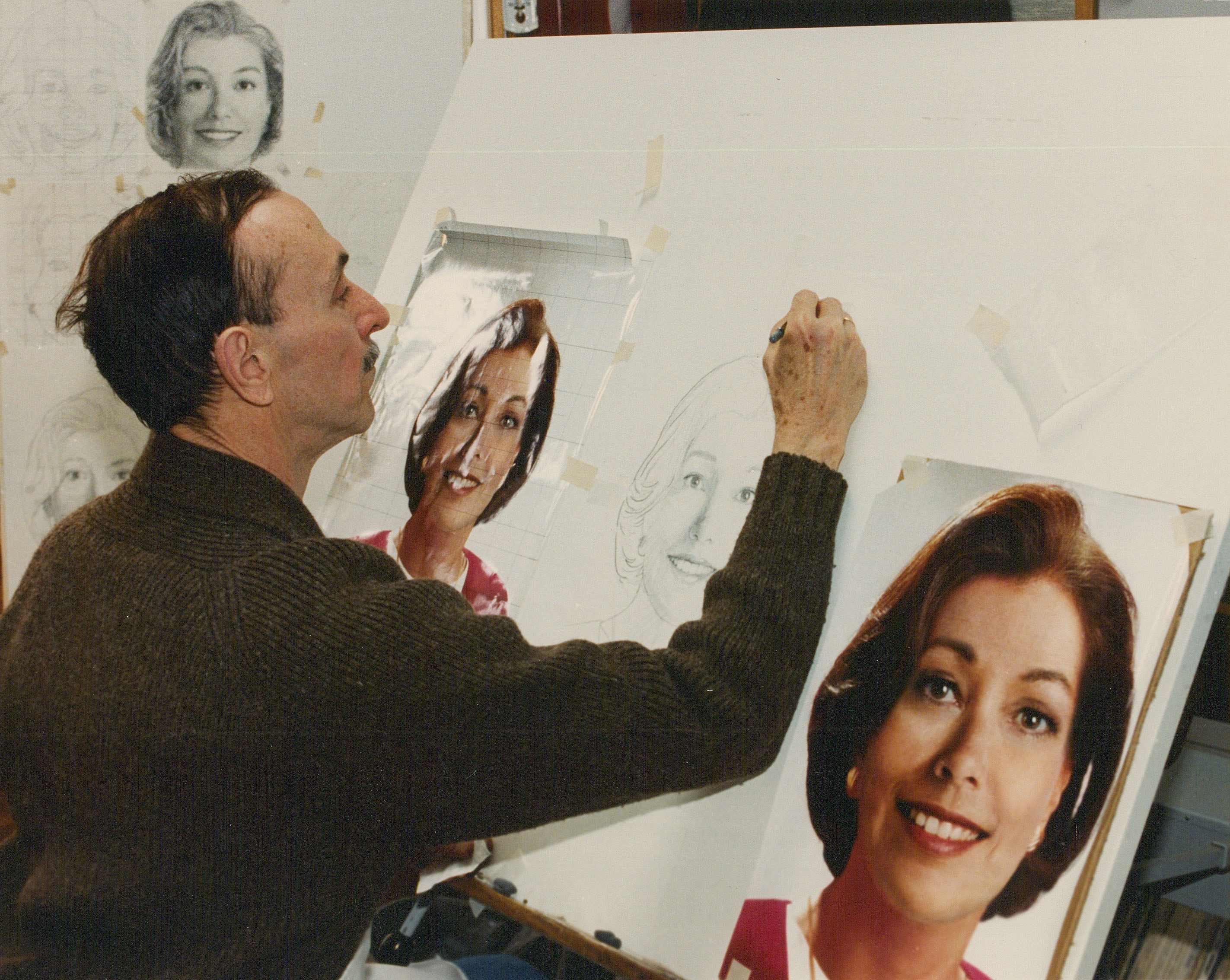 An artist sketching one of the official portraits of Betty Crocker.