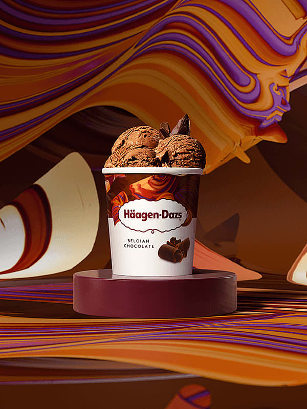 haagen dazs belgian chocolate ice cream pint arranged on a patterned brown background
