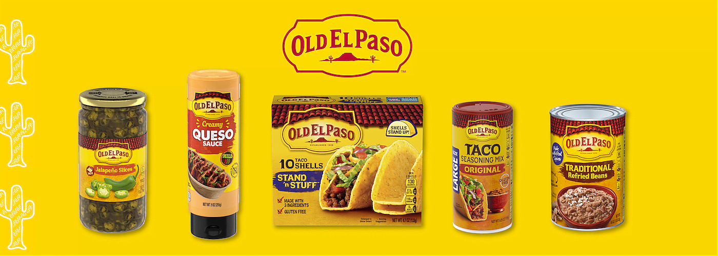 Old El Paso branded Mexican food products against a yellow background. A jar labeled Jalapeno Slices, another jar labeled Queso Sauce, a box of 10 Tortillas Stand 'N Stuff Soft Flour Tortillas, a packet labeled “Taco Seasoning Mix Original, and finally, a can of Traditional Refried Beans.